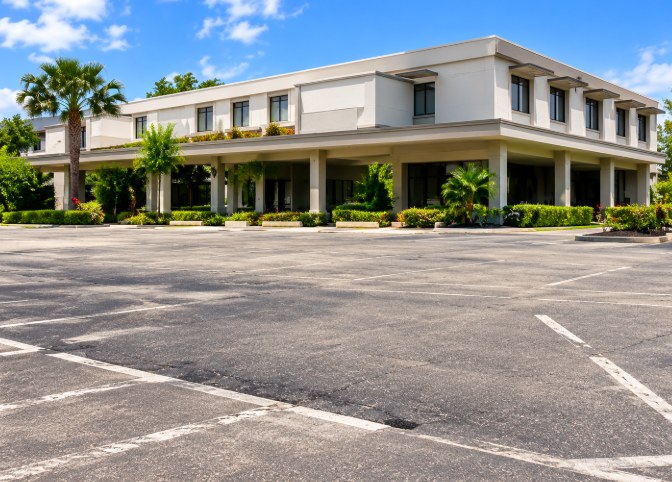 Commercial parking lot in front of a building